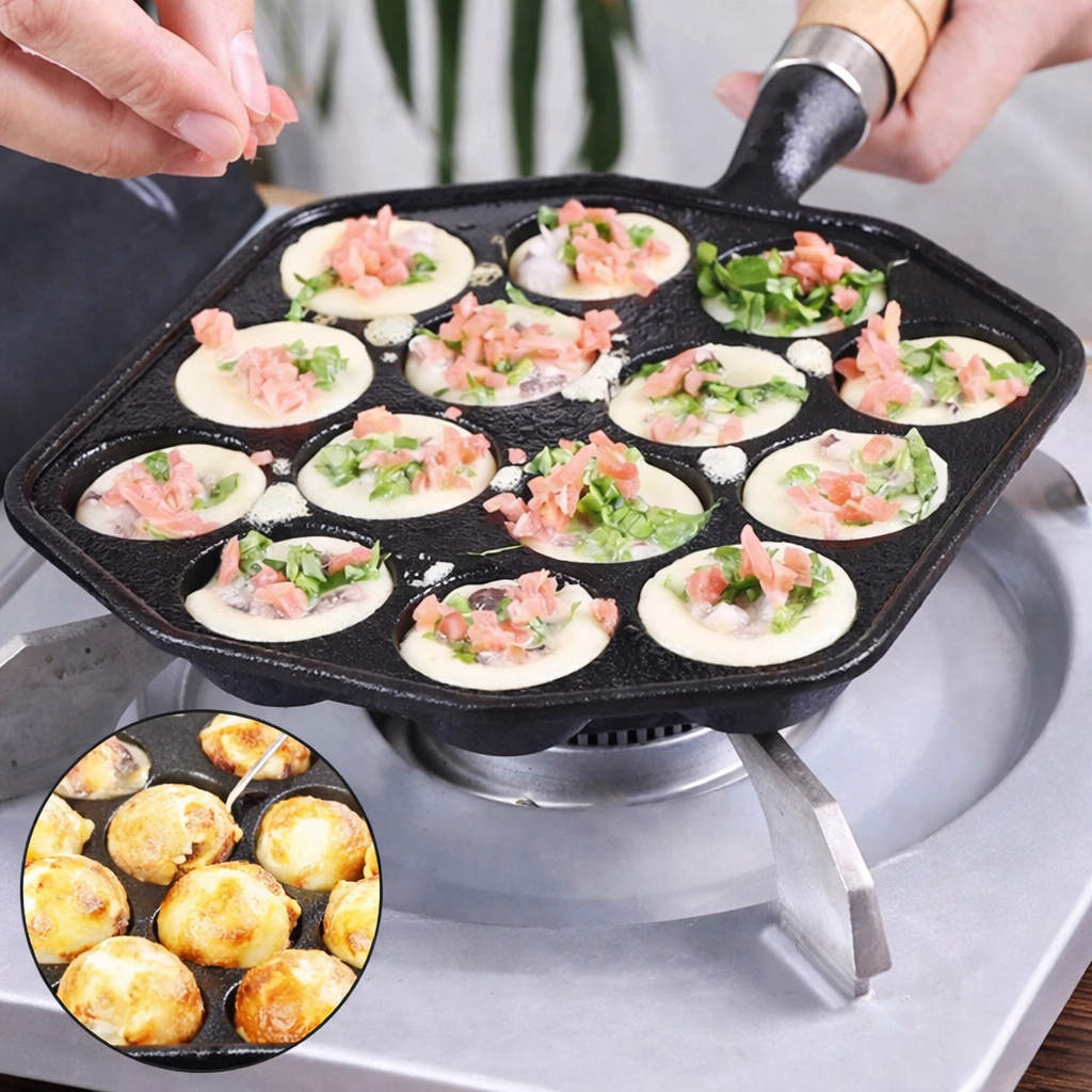 Black cast iron pan with small round molds filled with food on a stove.