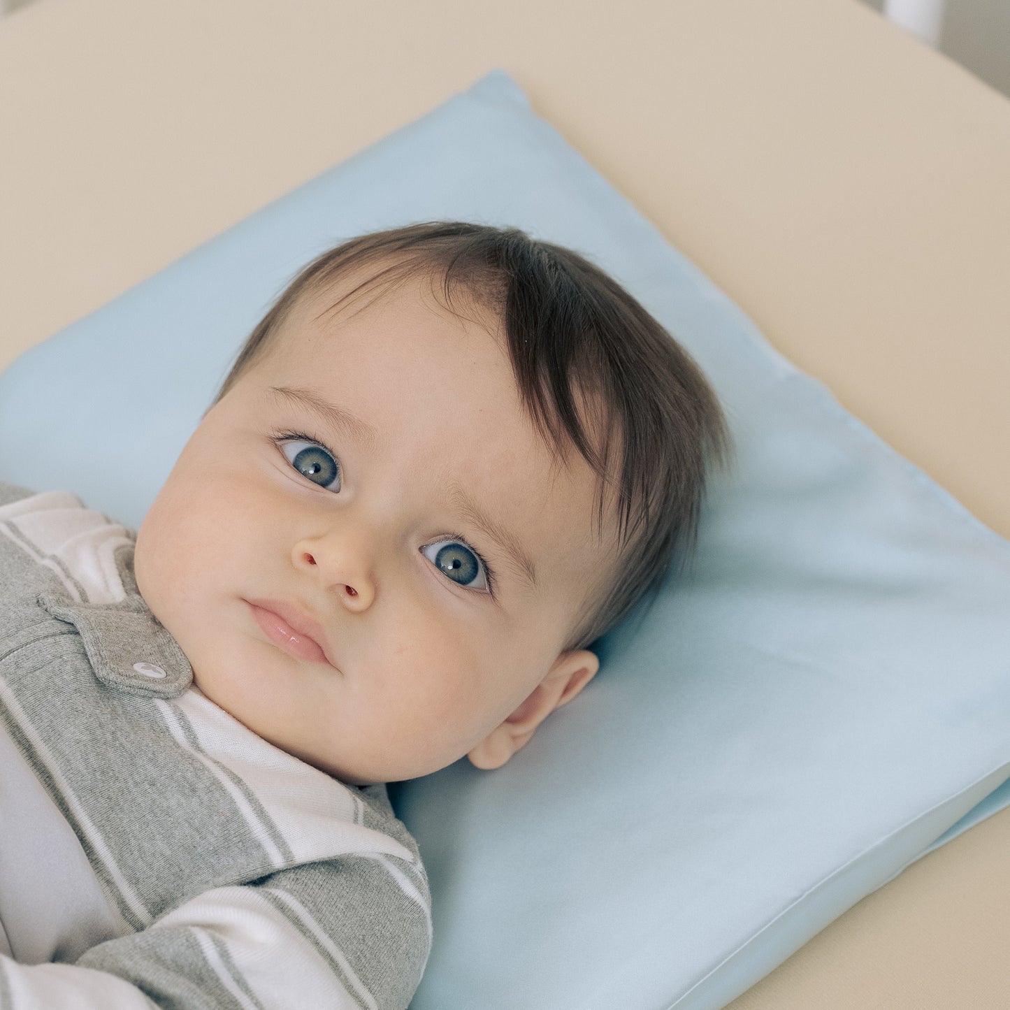 Baby blue premium silk baby pillow crafted from high-quality 6A silk for refined and sustainable infant comfort.