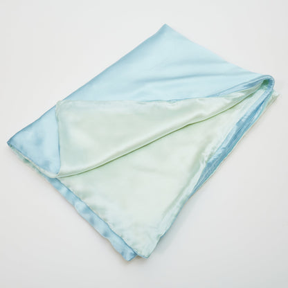 Baby blue silk blanket made from premium 6A silk, vegan and sustainable, breathable and ultra-soft for gentle infant comfort.