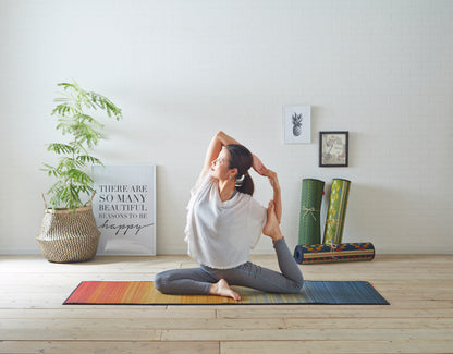 Japanese tatami yoga mat in Joy Green made from natural igusa rush grass, vegan and sustainable, breathable for yoga and stretching.